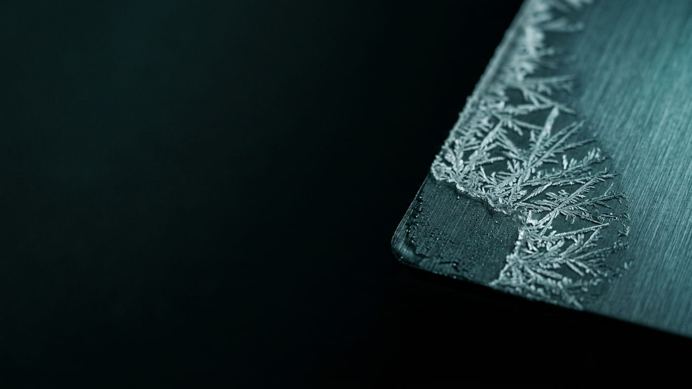 Illustration for this article: GDPR accountability for AI agents. Frost crystals spreading across a dark anodised panel, one corner already thawed.