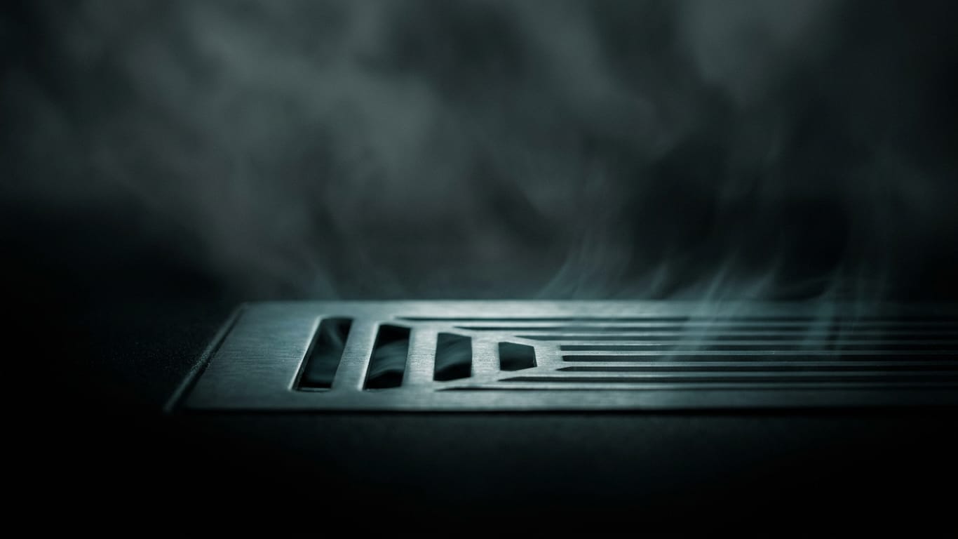 Illustration for this article: Hidden AI instructions on thousands of web pages. A ventilation grille in deep shadow, cold air distorting the light passing through it.