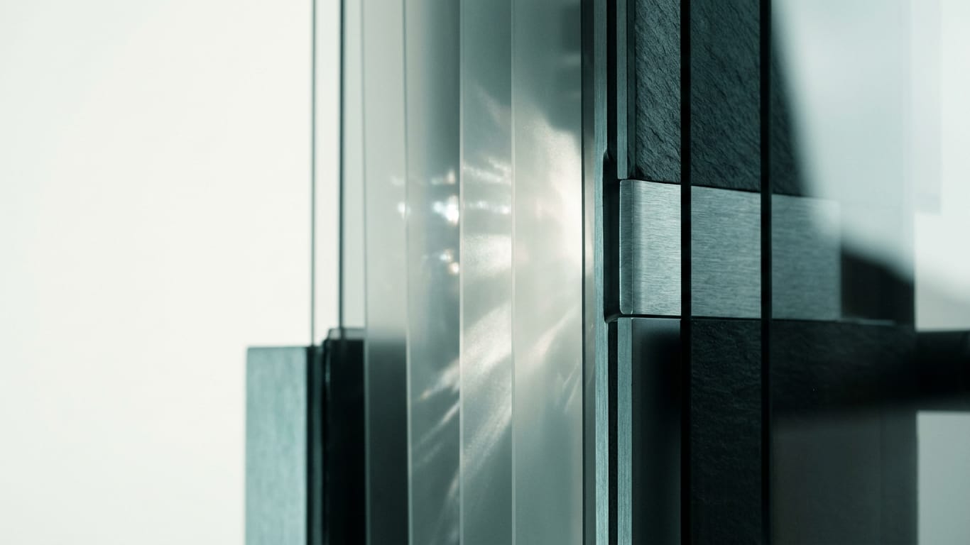 Illustration for this article: Vanguard reframes scalable AI as organisational. Layers of translucent film lifted apart, light scattering between the sheets.