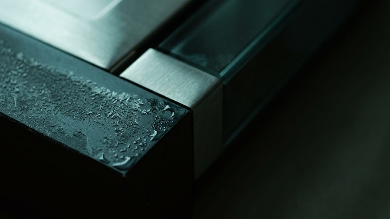 Illustration for this article: What the EU Commission expects from your AI supplier. Frost crystals spreading across a dark anodised panel, one corner already thawed.